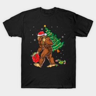 Bigfoot Carrying Christmas Tree Sasquatch Believer T-Shirt